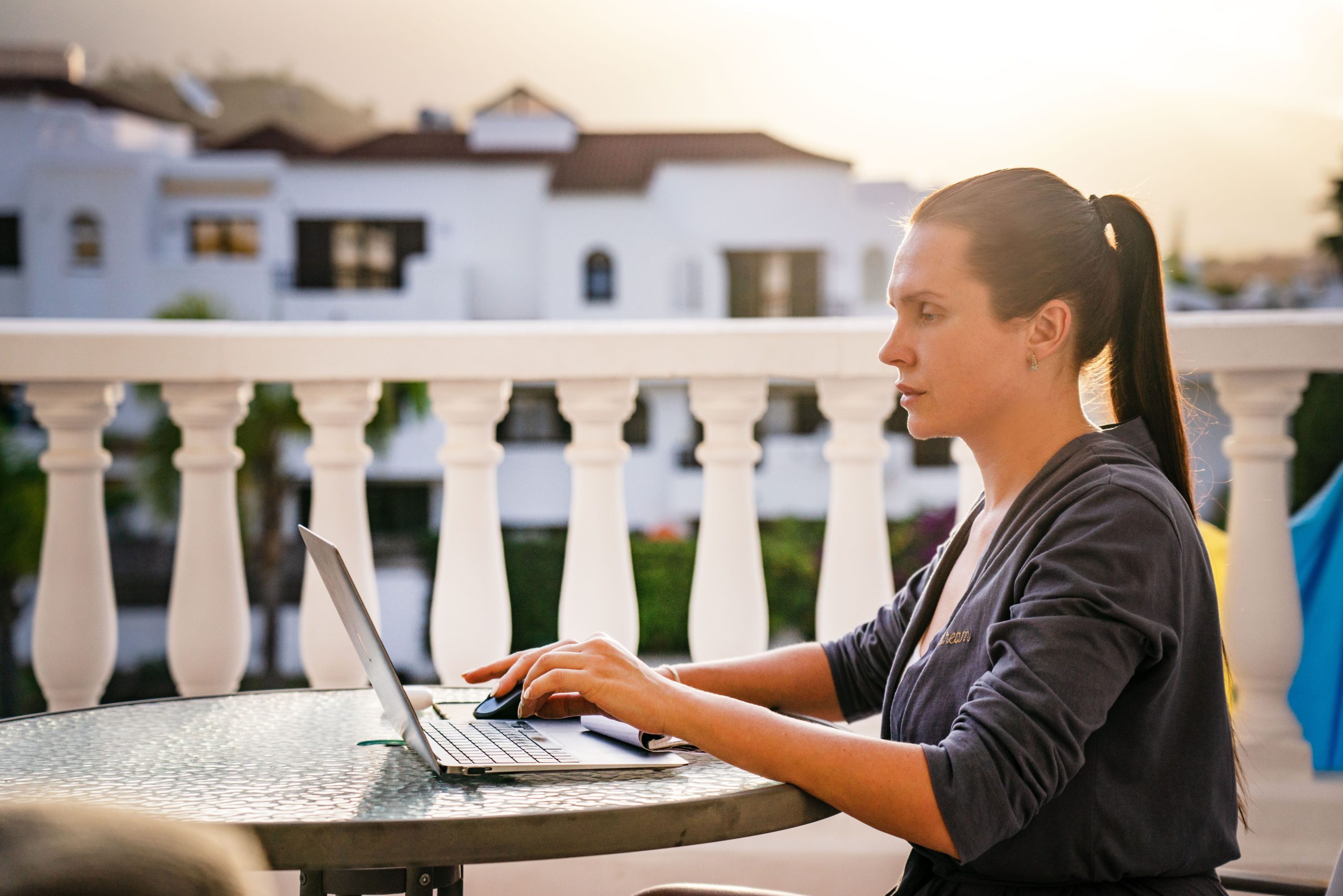 person working from luxury villa